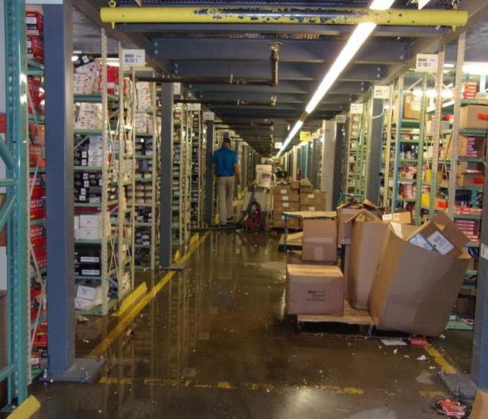 Standing water in warehouse. 
