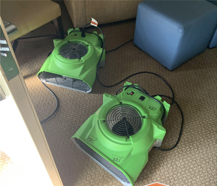 Two air movers on floor.