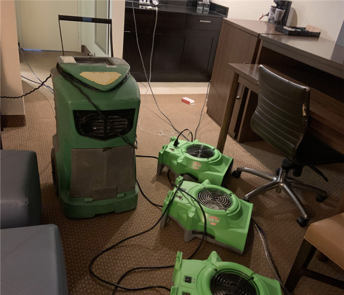 Dehumidifier and air movers in action.