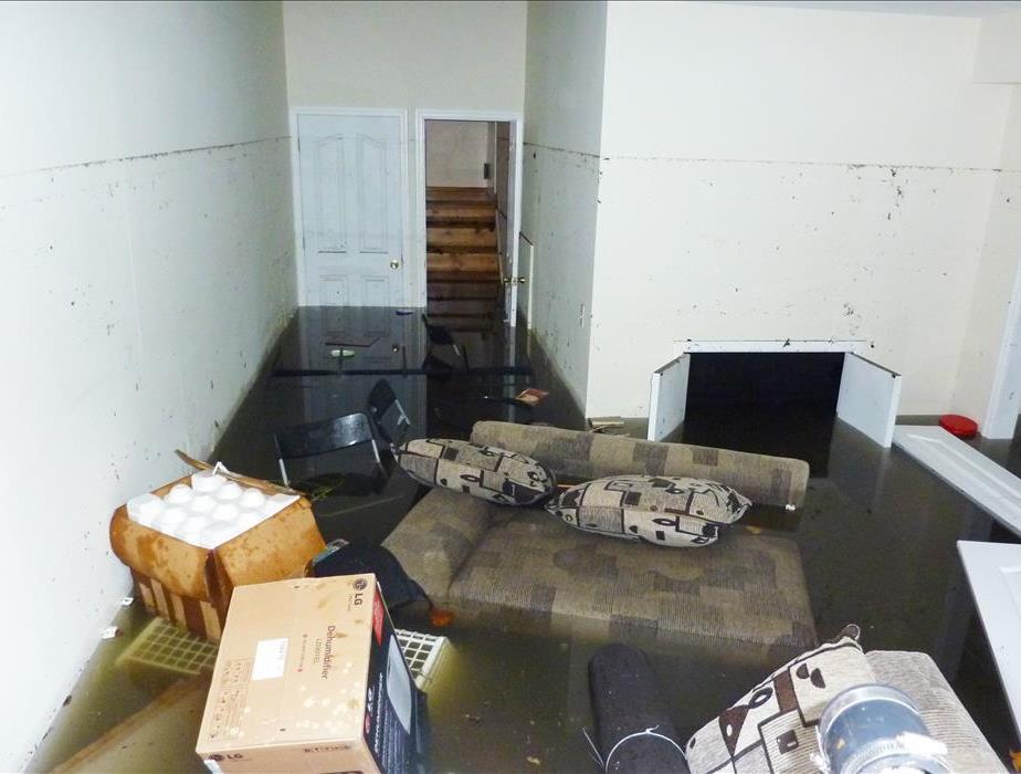 Completely flooded basement. There is a visible line showing maximum water level higher than 7 feet.